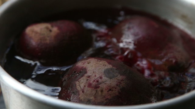 red beet cooked boil in the grey pan	