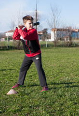 child with red plush that plays baseball