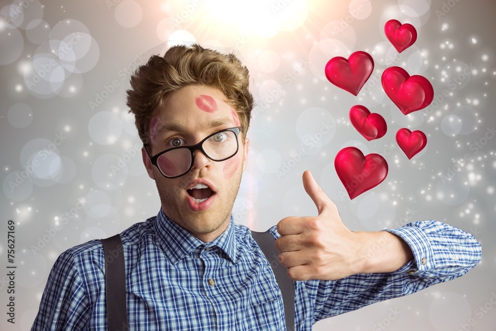 Poster composite image of geeky hipster covered in kisses