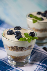 Fresh summer snack, blueberries yogurt and muesli