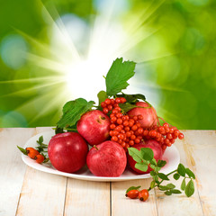 apples and berries on the table