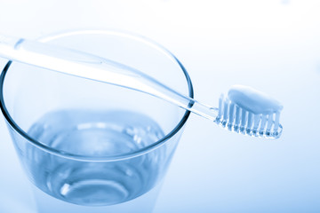 tooth brush in glass Isolated on white background