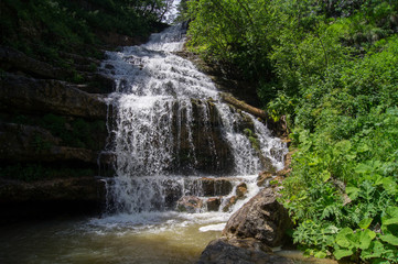 Fototapeta na wymiar Falls in mountains of caucasus