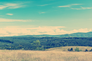 Retro Photo Of Summer Landscape With Mountains And Sky