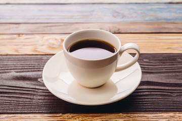 Black coffee in white cup