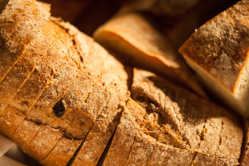 Sliced bread on cutting board closeup
