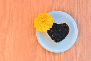 Black glutinousrice in bowl shape heart