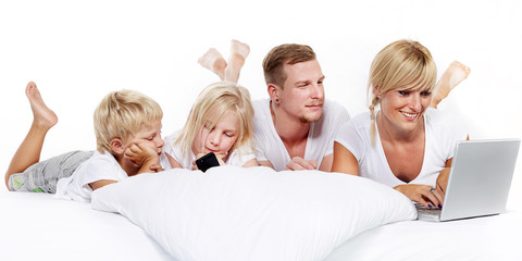 Happy family stay in bed