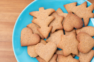 blue bowl full of homemade cookies