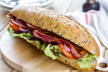 Bacon on wholemeal and sesame baguette sandwich