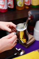 Woman preparing coffee, close up