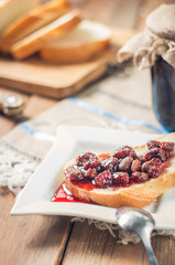 Strawberry Jam, bread on the table background