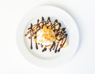 banana crepe cake with chocolate sauce