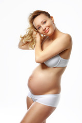 Szczęśliwa kobieta w ciąży - obrazy, fototapety, plakaty