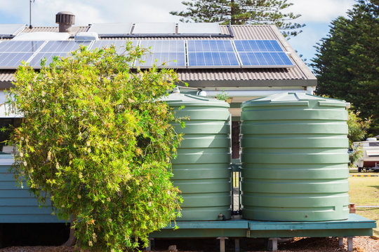 Water tank and solar panels