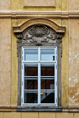 Window with pediment in Prague, Czech Republic