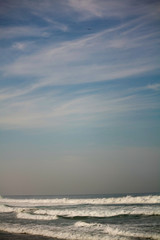 Obraz premium Zicatela beach and eagle in the sky over waves Puerto Escondido