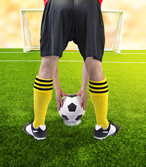 Fototapeta premium A soccer ball in front of goal