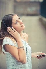 young beautiful woman girl autumn listening music