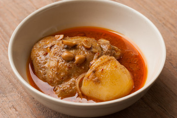 Close up Muslim style chicken and potato curry or chicken mussam