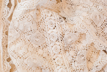 a background image of ivory-colored lace cloth