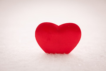 Fototapeta premium Red heart on snow