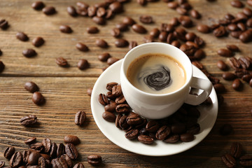 Cup of coffee on wooden table