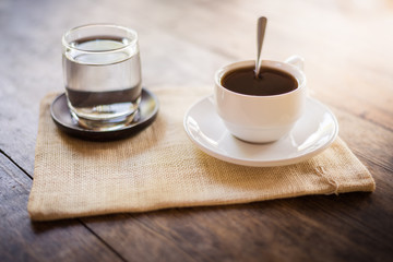 Cup of coffee on a wooden table