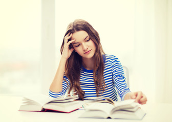 stressed student girl with books