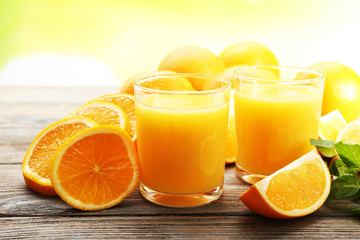 Glass of orange juice and slices
