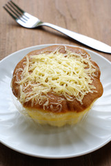 Philippines sponge cake call mamon on white plate.