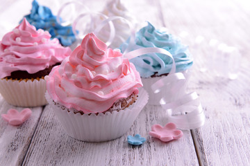 Delicious cupcakes on table close-up