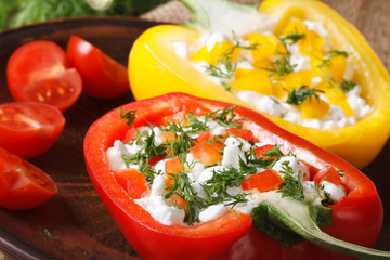 peppers filled with curd and dill closeup horizontal, rustic