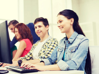 group of smiling students having discussion