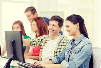 female student with classmates in computer class