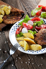 Grilled meat with salad.