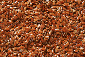 Brown flax seeds background