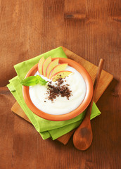 Semolina or rice pudding with apple and chocolate
