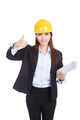 Asian engineer woman thumbs up with blueprints
