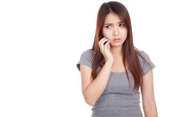 Fototapeta premium Young Asian woman got toothache