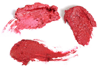 Lipstick strokes isolated on white background