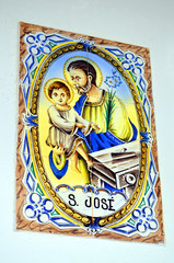 Tiles with a male with a child in Alte, Portugal