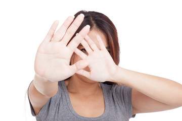 Young Asian woman hide her face with hand