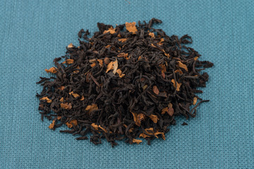 Black dry tea with petals