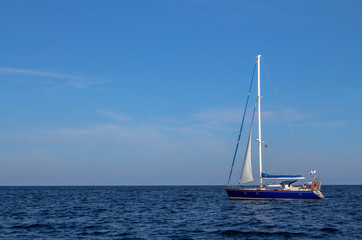 Fototapeta premium A lonely sail in the sea