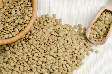 Fototapeta premium lentils, on table cloth, background, close up