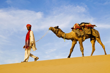 Indigenous Indian Man Walking Desert Camel Concept © Rawpixel.com
