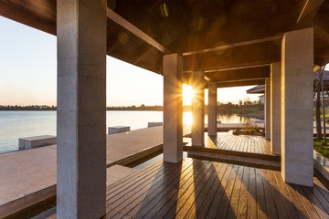 resort lakeside pavilion at sunset