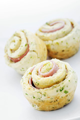 Cheese Ham roll bread on white plate