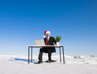 Businessman working Wintertime Holiday Vacation Concept